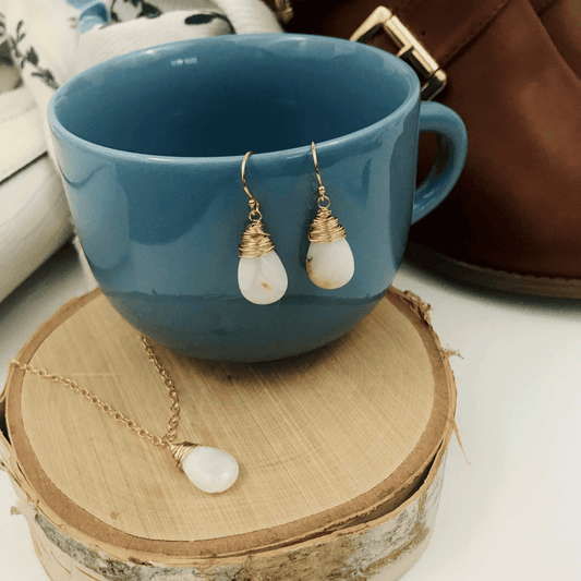 Opal teardrop earring in gold and opal pendant necklace
