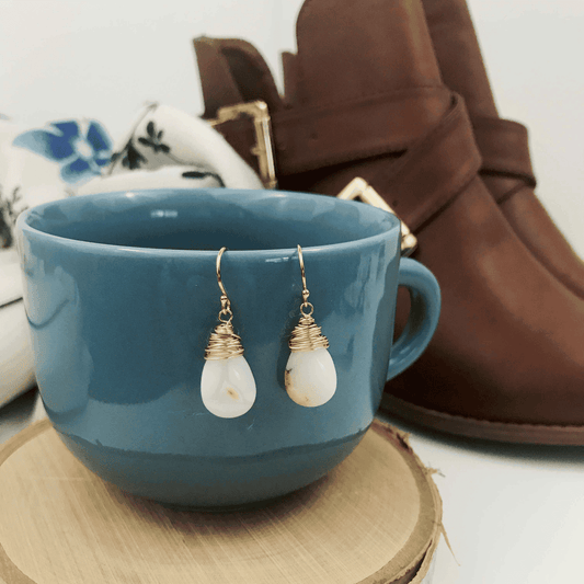 Opal teardrop earrings in gold